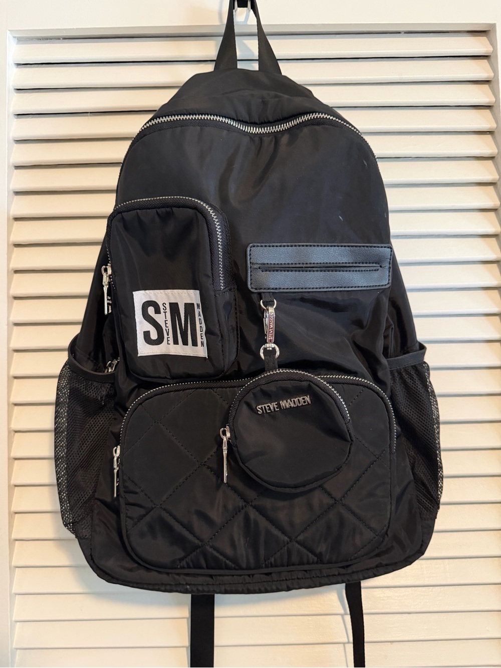 Steve Madden Black Quilted Nylon Backpack with Multi Pocket Design